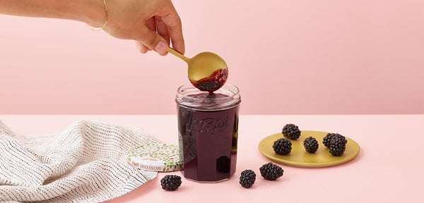 Homemade wild blackberry jam recipe in a Le Parfait jar