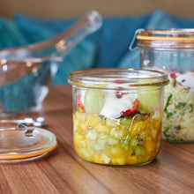 Load image into Gallery viewer, Le Parfait Bistrot Jar of fruit salad beside a clip jar of couscous with herbs on a wooden table, lid set aside.