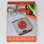 Le Parfait kitchen scale retail box front - 'Les Essentiels Balance Électronique' with raspberries weighed on the scale.