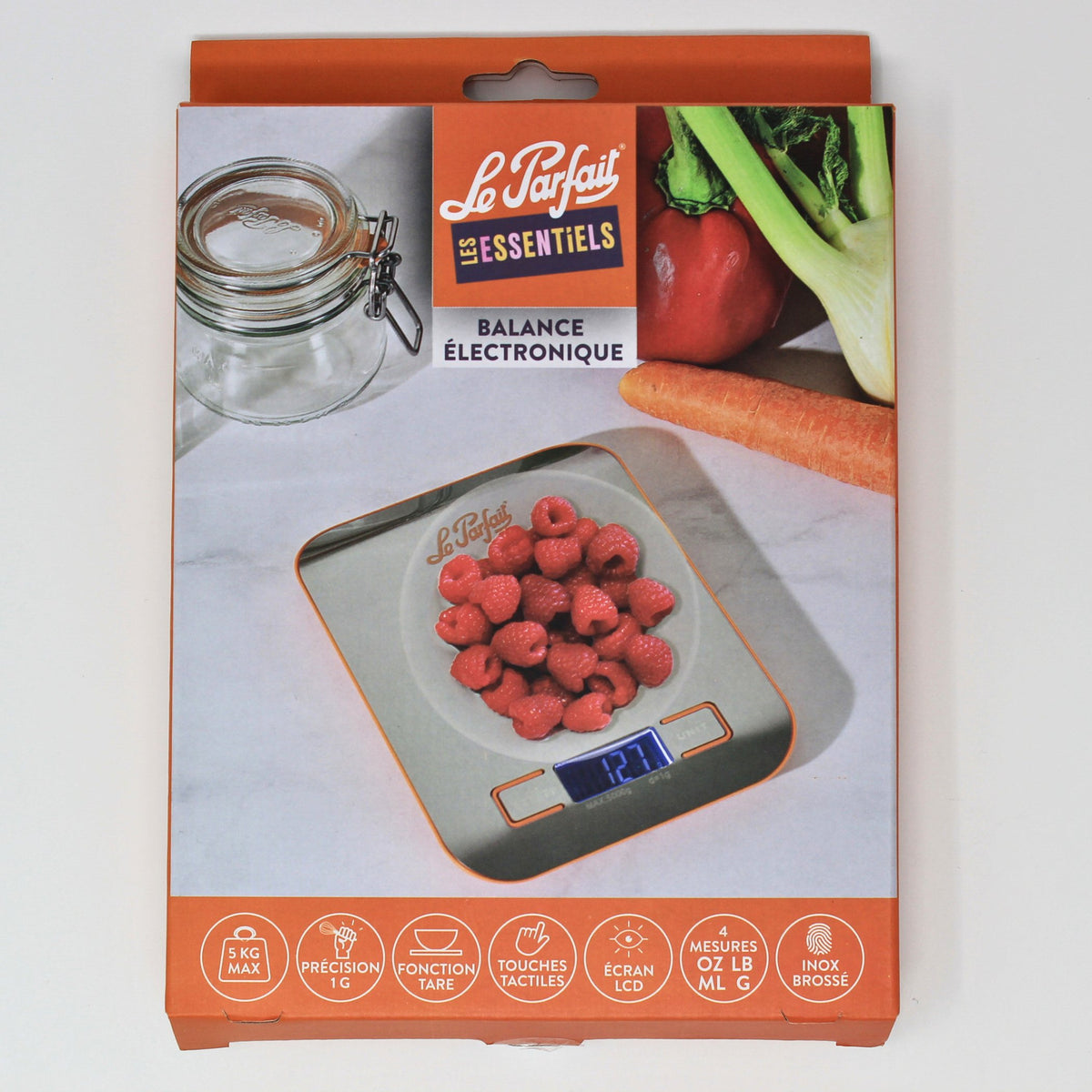 Le Parfait kitchen scale retail box front - 'Les Essentiels Balance Électronique' with raspberries weighed on the scale.