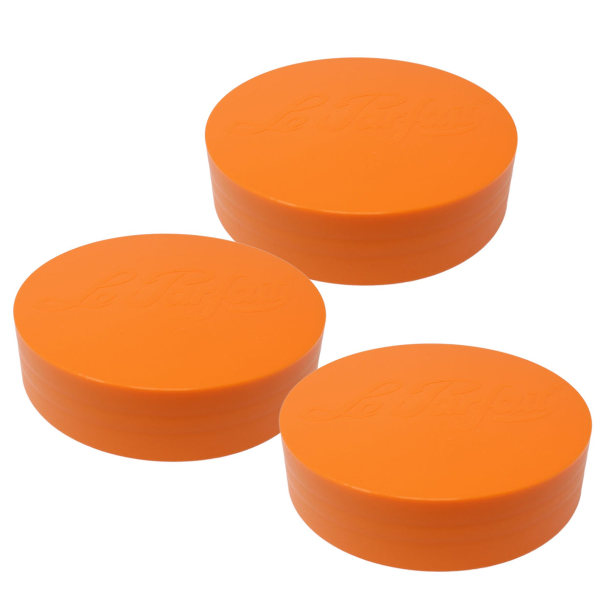 Three orange Le Parfait plastic screw-top jar lids stacked together, embossed Le Parfait logo on top.