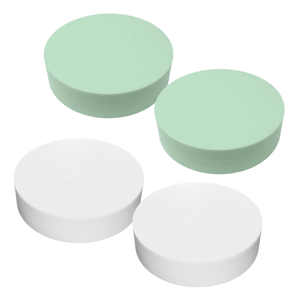 Le Parfait Fresh Start multipack of plastic screw-top jar lids - two mint and two white.