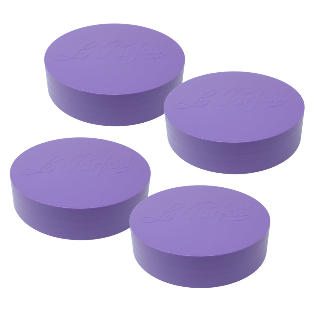 Four violet Le Parfait plastic screw-top jar lids with embossed logo, angled product shot.