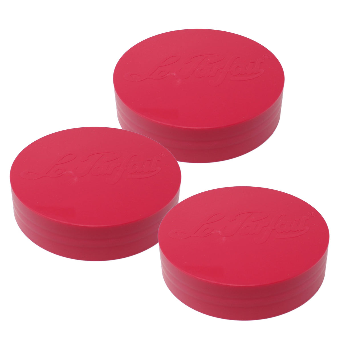 Three red Le Parfait plastic screw-top jar lids stacked together, embossed Le Parfait logo on top.