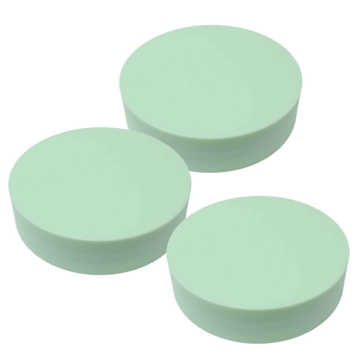 Three mint Le Parfait plastic screw-top jar lids stacked together, embossed logo on top.