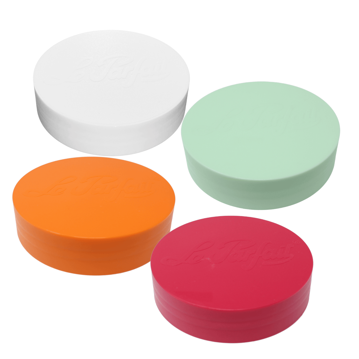 Le Parfait Summer Sunrise multipack of plastic screw-top jar lids - one red, one white, one orange, and one mint.