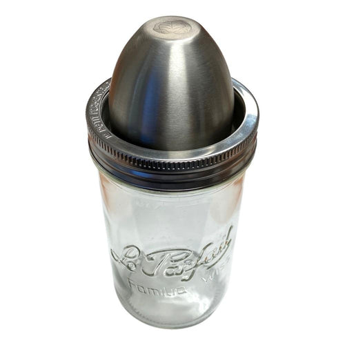 ChouAmi fermentation kit retail card - stainless steel device on a Le Parfait Familia Wiss jar with pickled cucumbers and peppers.