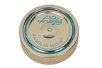 Top-down Le Parfait Familia Wiss gold sealing cap with teal 'pierce-here' indicator and 'Le Parfait Familia Wiss' branding.