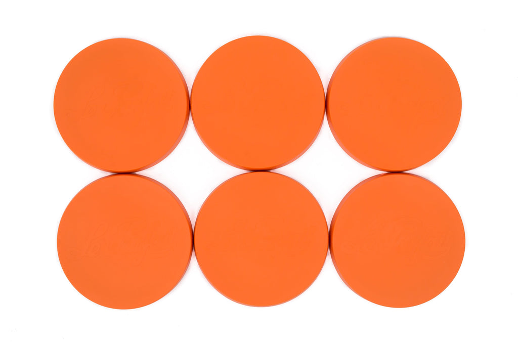 Six orange Le Parfait Super Snap Cover Lids arranged in a 2x3 grid, top-down view.