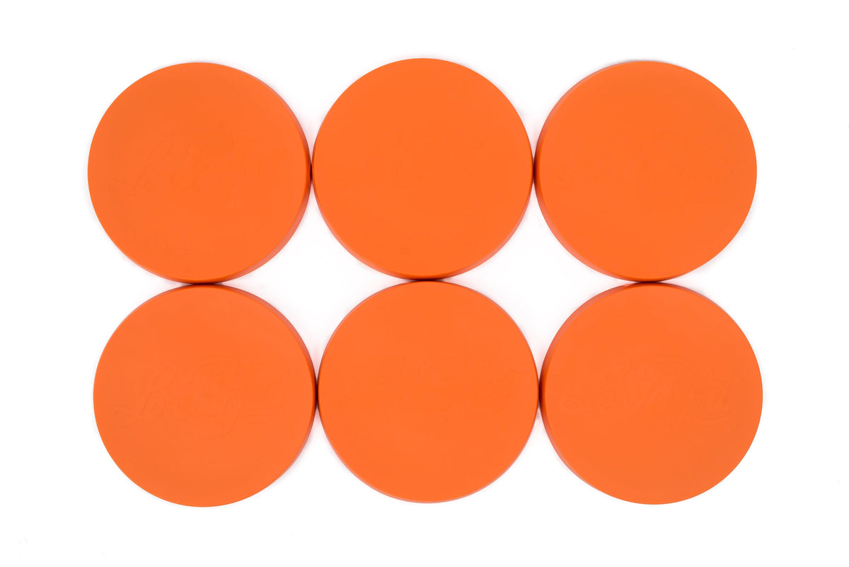 Six orange Le Parfait Super Snap Cover Lids arranged in a 2x3 grid, top-down view.